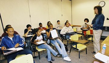 classroom with teacher and students