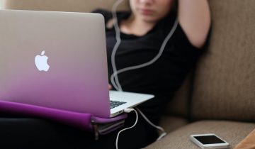 Teenager looking at computer screen
