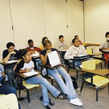classroom with teacher and students