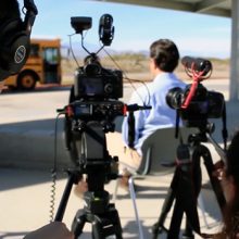students videotaping an interview