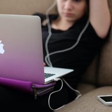 Teenager looking at computer screen
