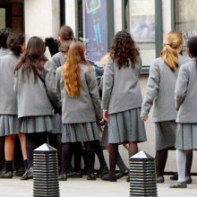 Group of London-based students in school uniform